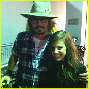 Johnny Depp With Avery At Justin Bieber's Concert